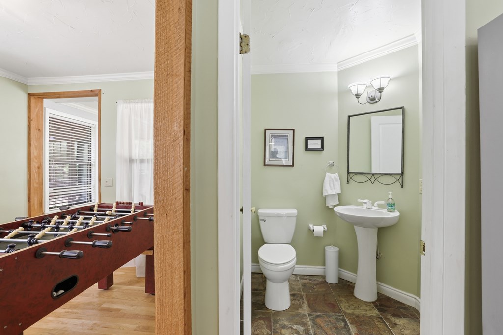 4541 Winding Stairs Road Topton, NC 28781 - Photo 12 of 34 a bathroom with a toilet sink and mirror