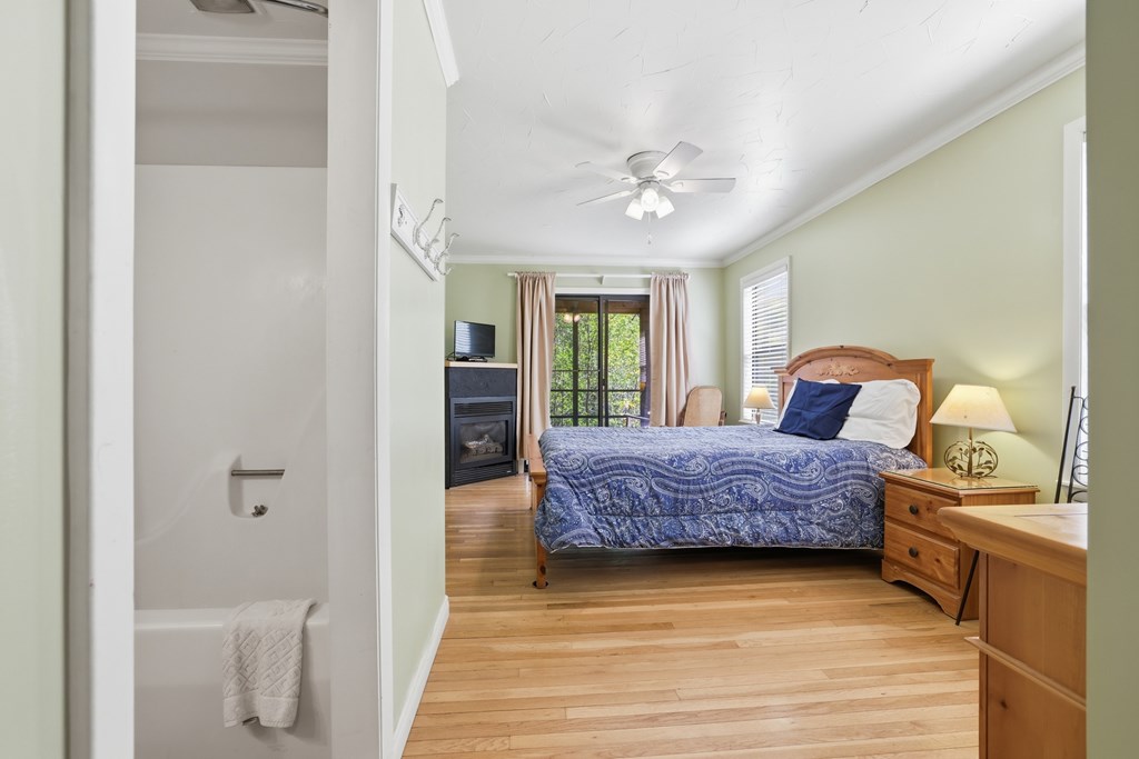 4541 Winding Stairs Road Topton, NC 28781 - Photo 18 of 34 a spacious bedroom with a bed and a closet