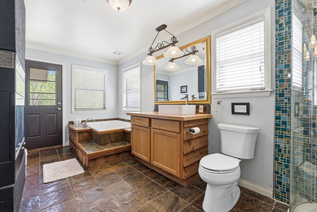 4541 Winding Stairs Road Topton, NC 28781 - Photo 24 of 34 a bathroom with a toilet a sink and a bathtub