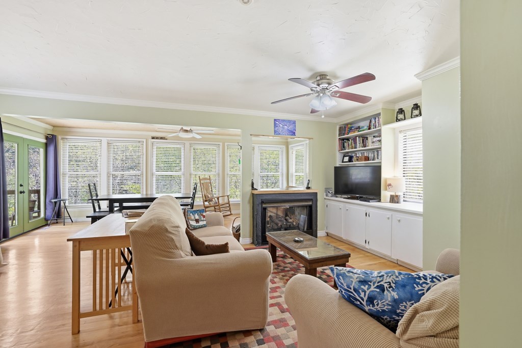 4541 Winding Stairs Road Topton, NC 28781 - Photo 6 of 34 a living room with furniture a flat screen tv and a fireplace