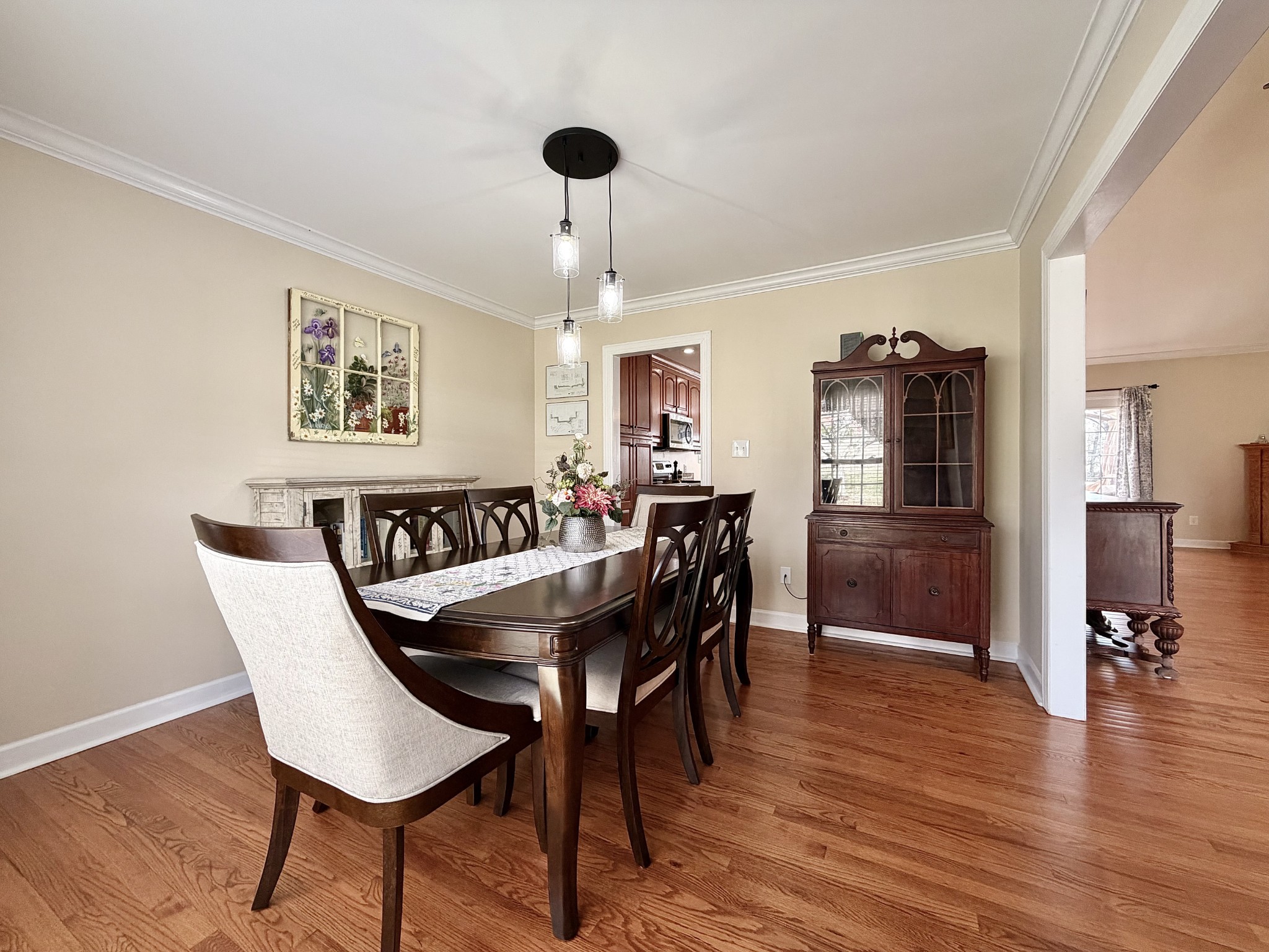 101 Mimi Circle Pulaski, TN 38478 - Photo 16 of 56 a view of a dining room with furniture wooden floor and chandelier
