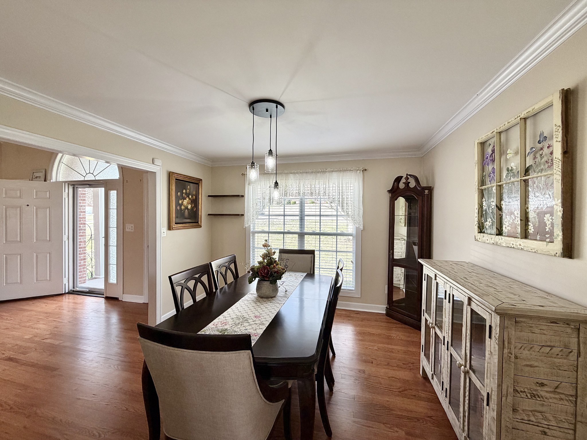 101 Mimi Circle Pulaski, TN 38478 - Photo 17 of 56 a view of a dining room with furniture window and wooden floor