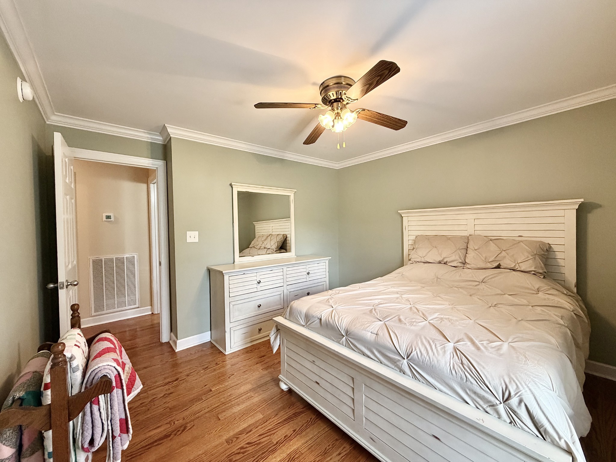 101 Mimi Circle Pulaski, TN 38478 - Photo 34 of 56 a bedroom with a bed and wooden floor