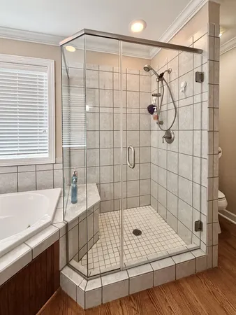 a bathroom with a sink a toilet and tub