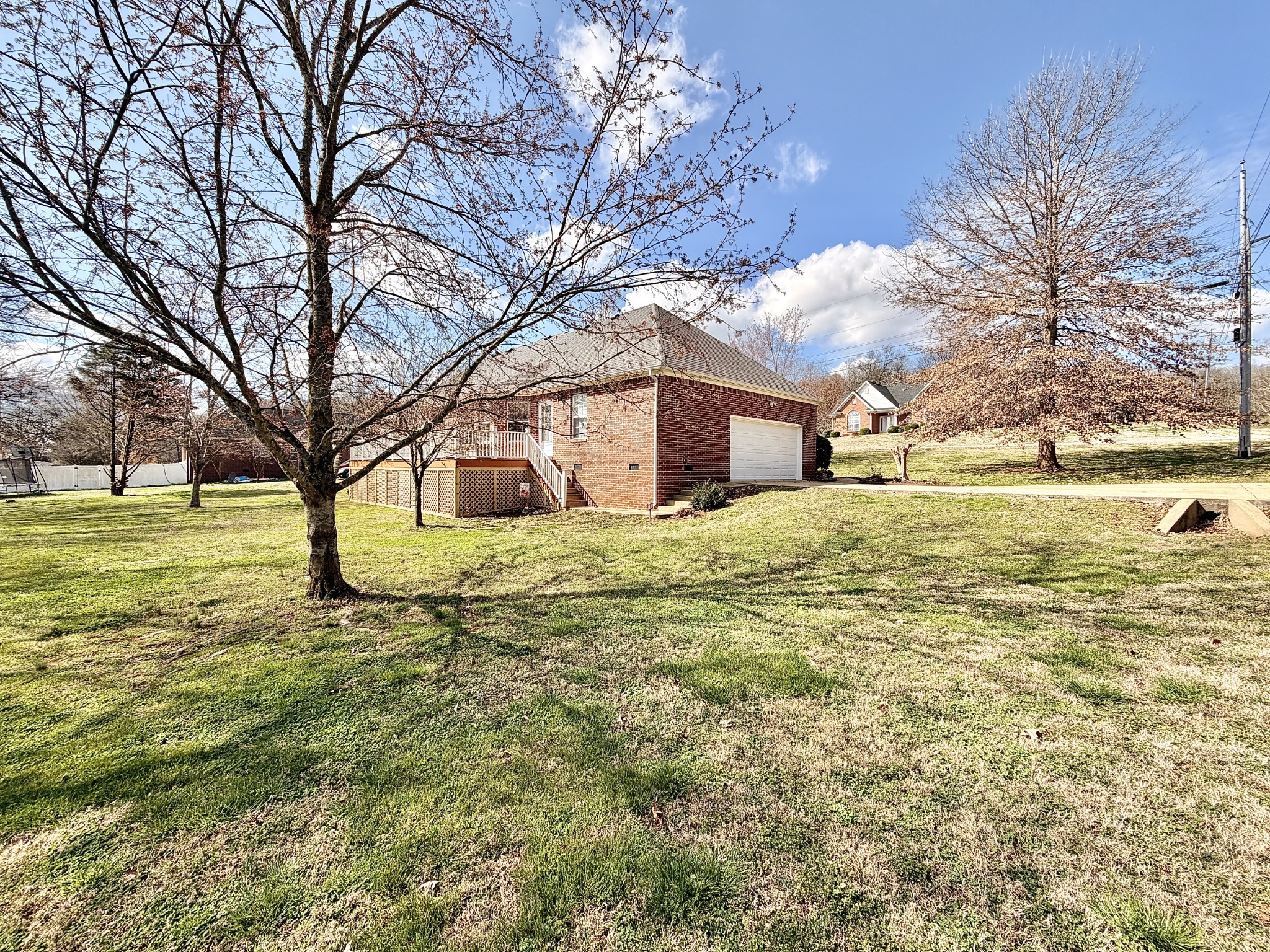 101 Mimi Circle Pulaski, TN 38478 - Photo 51 of 56 a large house with a big yard and large trees