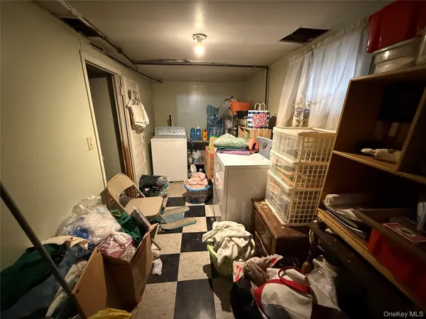 a room with furniture toys and a flat screen tv