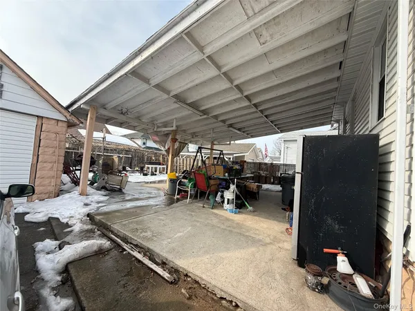 a view of a chairs and tables in patio
