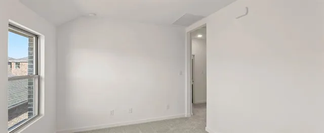 a view of hallway with a window