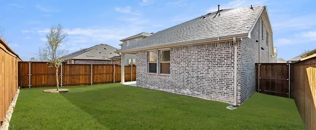 a view of backyard of house
