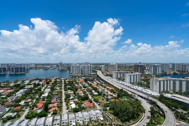 a view of a lake with a city