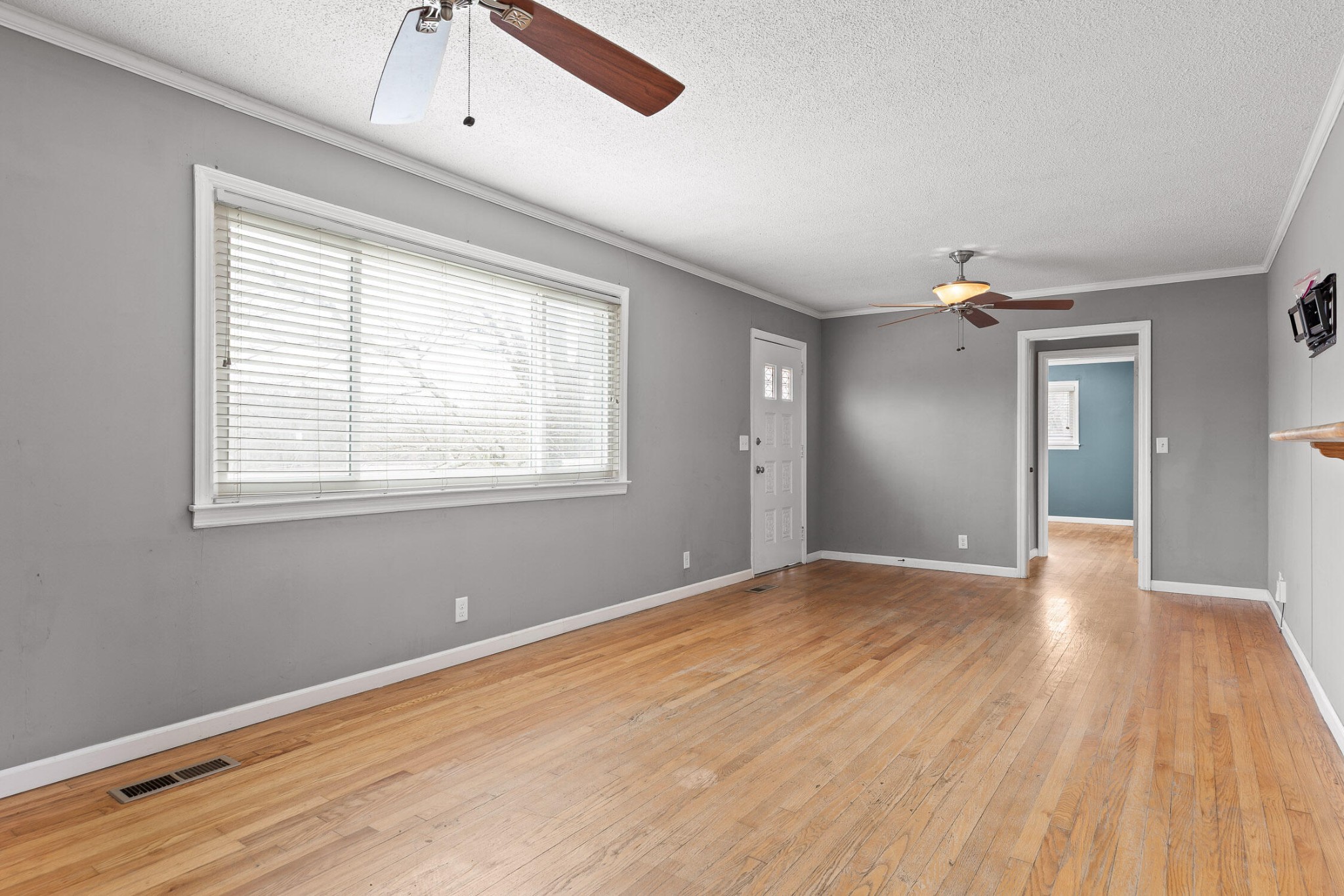 45 Virginia Avenue Rossville, GA 30741 - Photo 5 of 28 a view of an empty room with wooden floor and a window