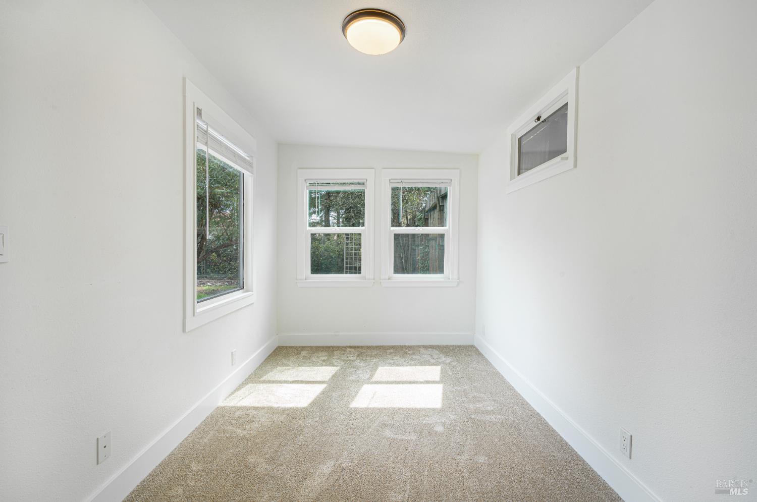 810 Brush Creek Road, Unit B Santa Rosa, CA 95404 - Photo 19 of 25 an empty room with a window