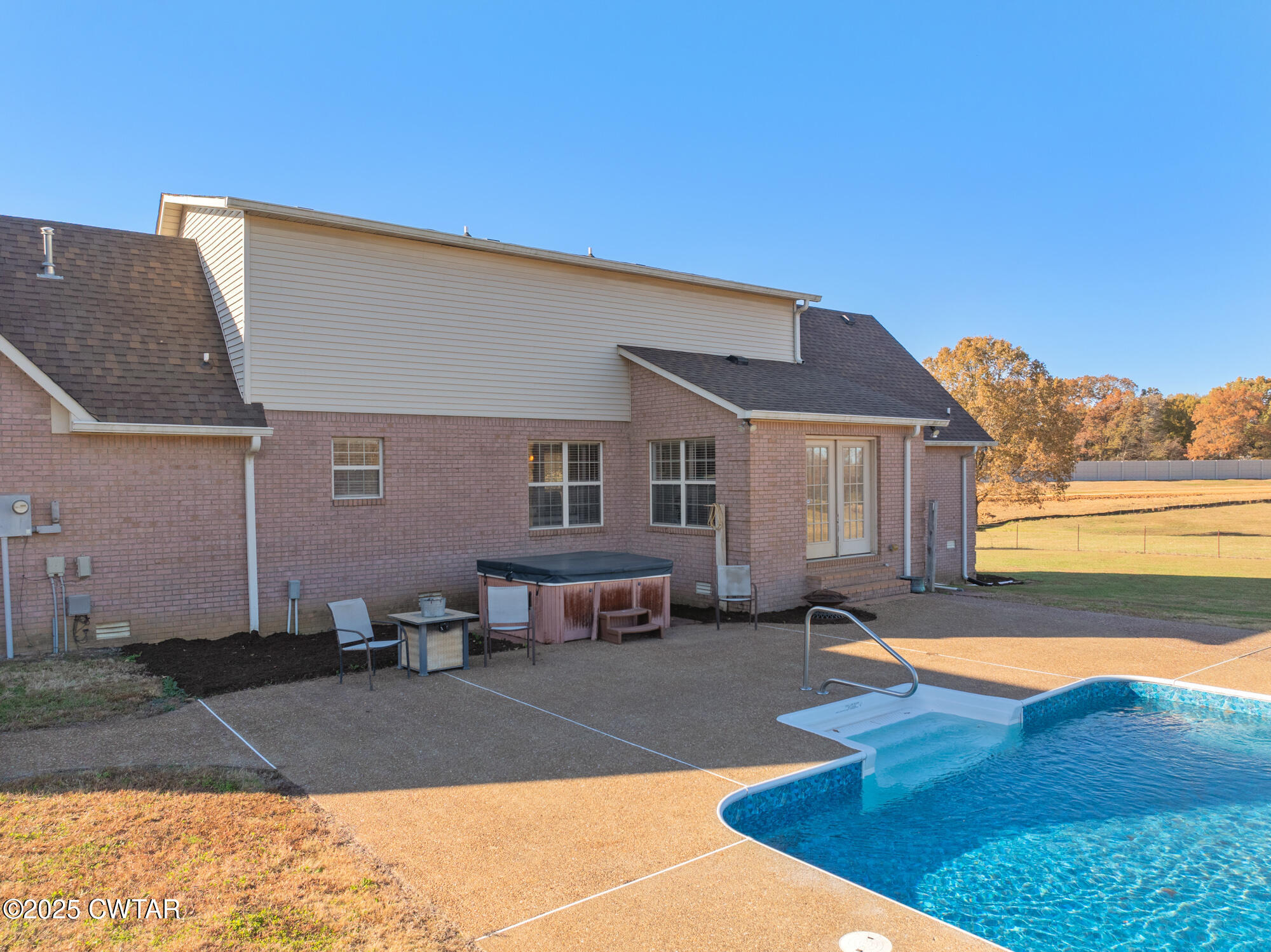 1100 Power Station Road Trezevant, TN 38258 - Photo 27 of 40 a front view of a house with a yard