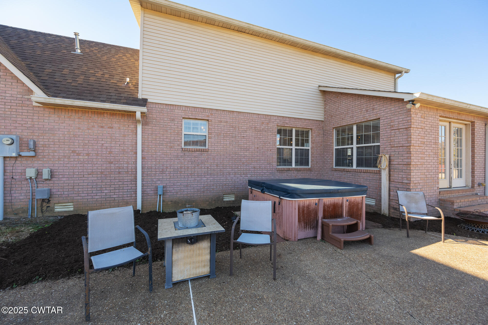 1100 Power Station Road Trezevant, TN 38258 - Photo 28 of 40 a backyard of a house with outdoor seating