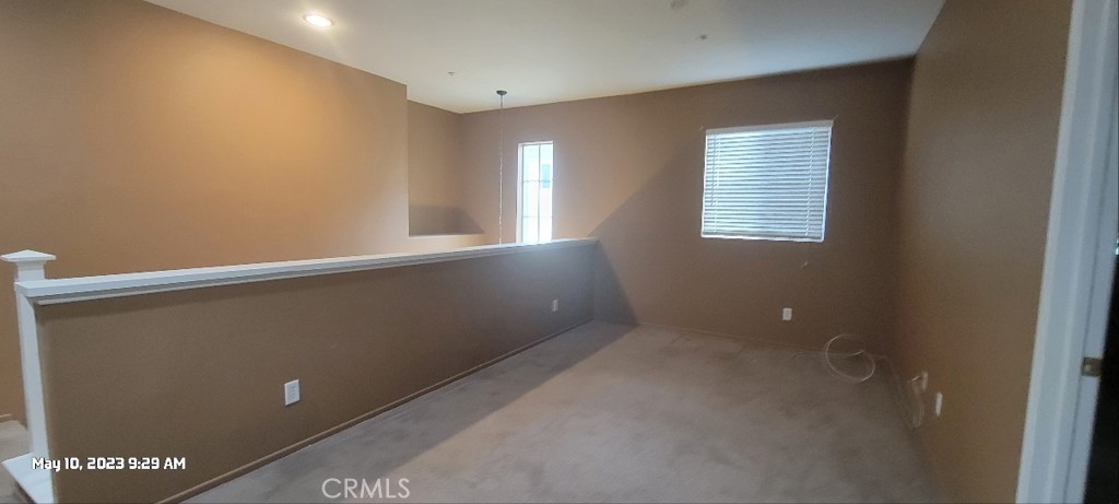11305 Riverleaf Drive Riverside, CA 92505 - Photo 11 of 22 a view of an empty room with a window