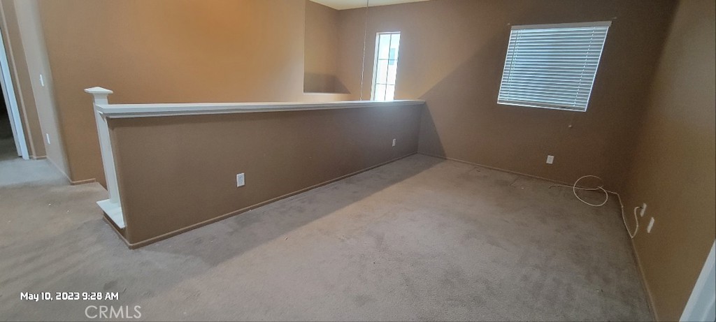 11305 Riverleaf Drive Riverside, CA 92505 - Photo 9 of 22 an empty room with windows