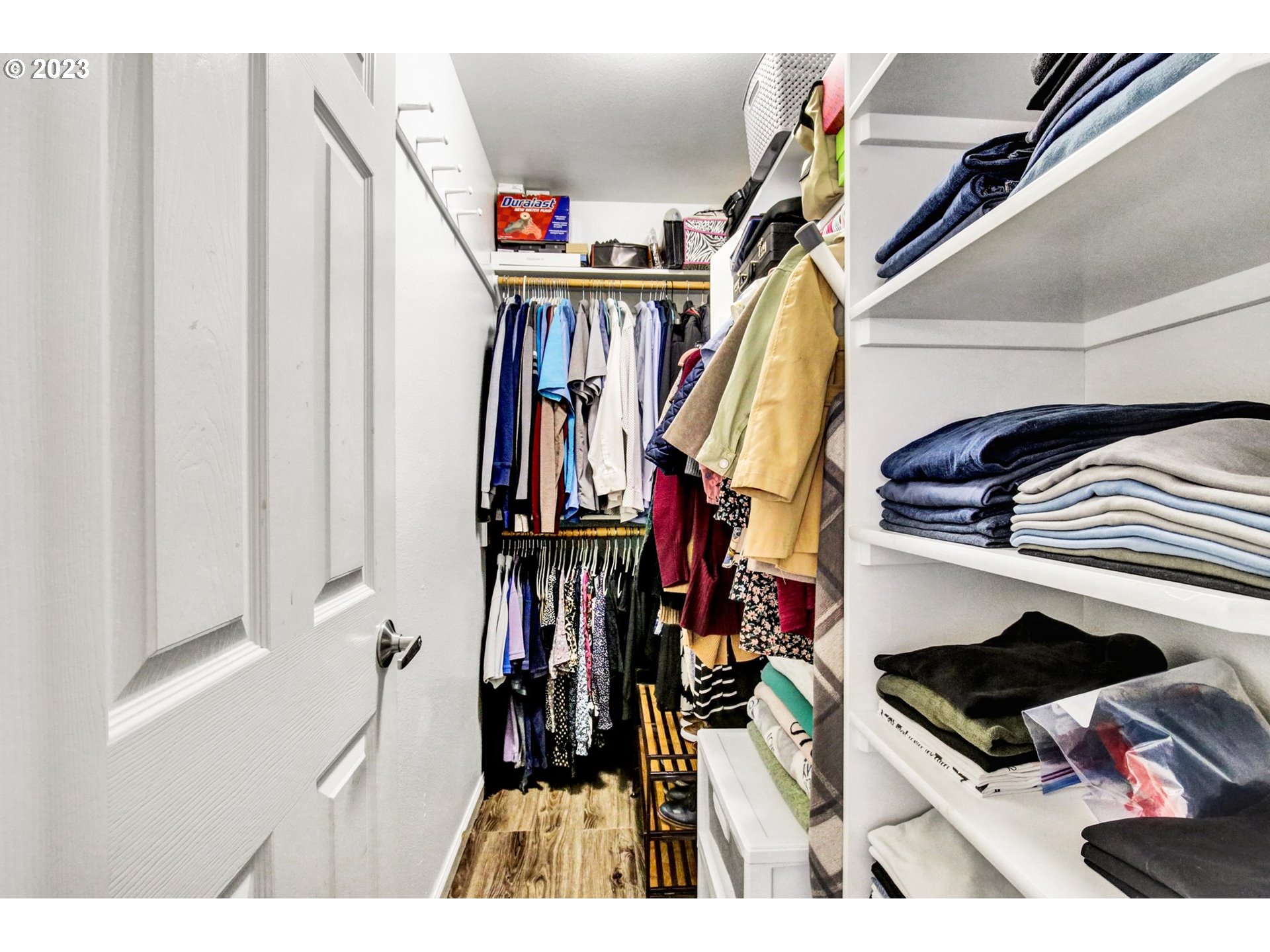 16128 Southeast Rural Court Portland, OR 97236 - Photo 19 of 37 a view of walk in closet with clothes and shoes