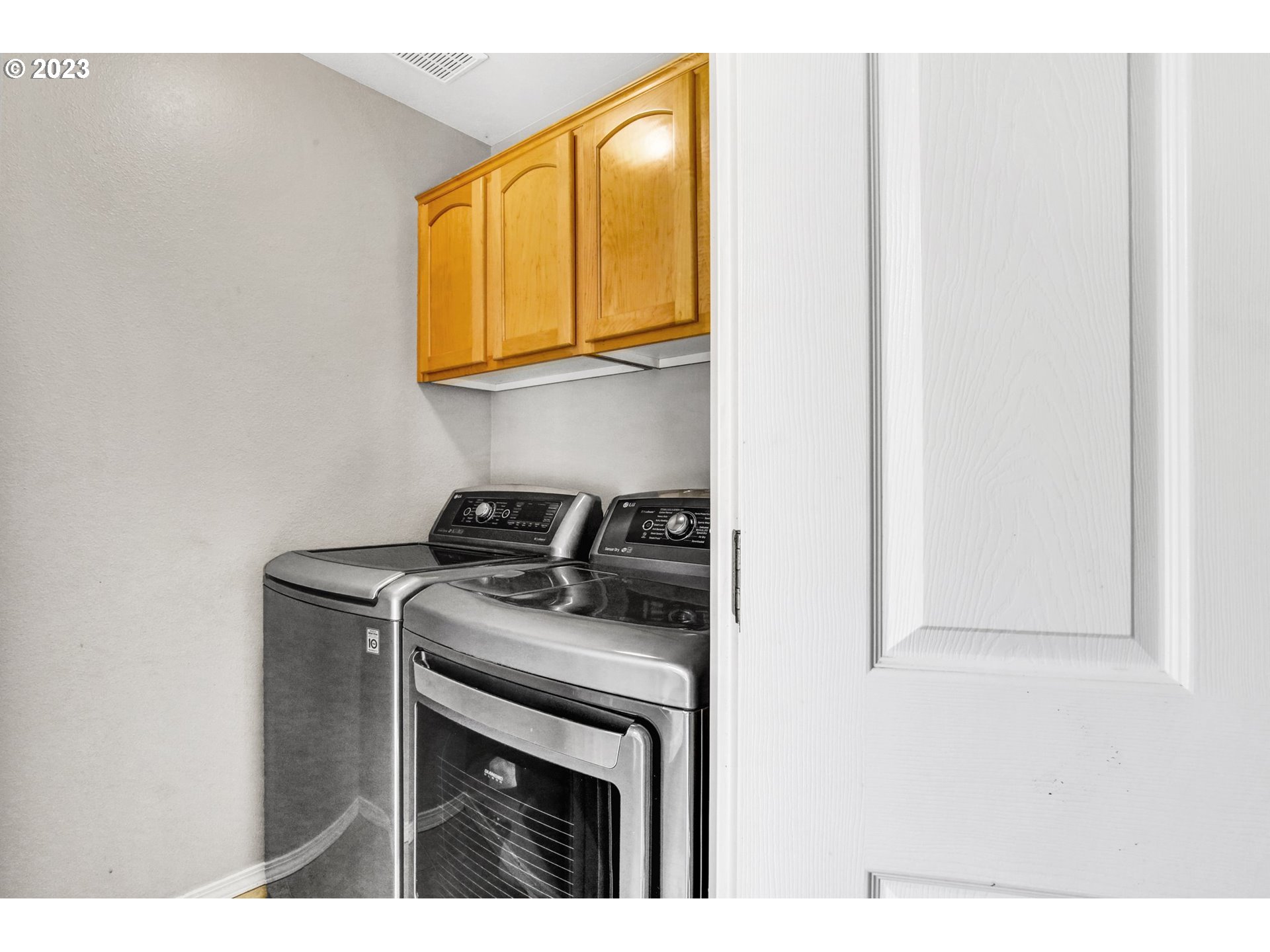 16128 Southeast Rural Court Portland, OR 97236 - Photo 22 of 37 a kitchen with a stove and a microwave