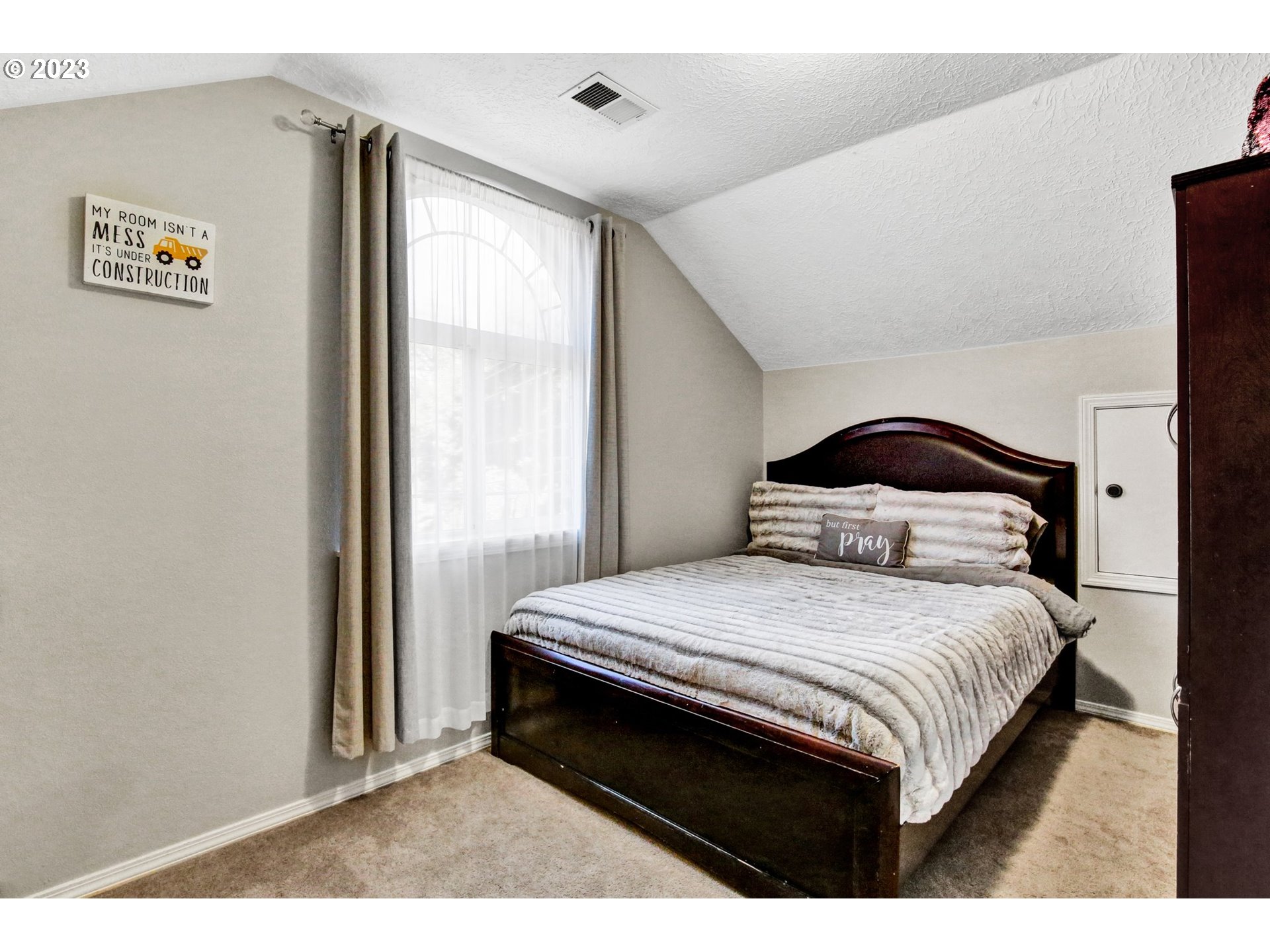 16128 Southeast Rural Court Portland, OR 97236 - Photo 29 of 37 a bedroom with a bed and window