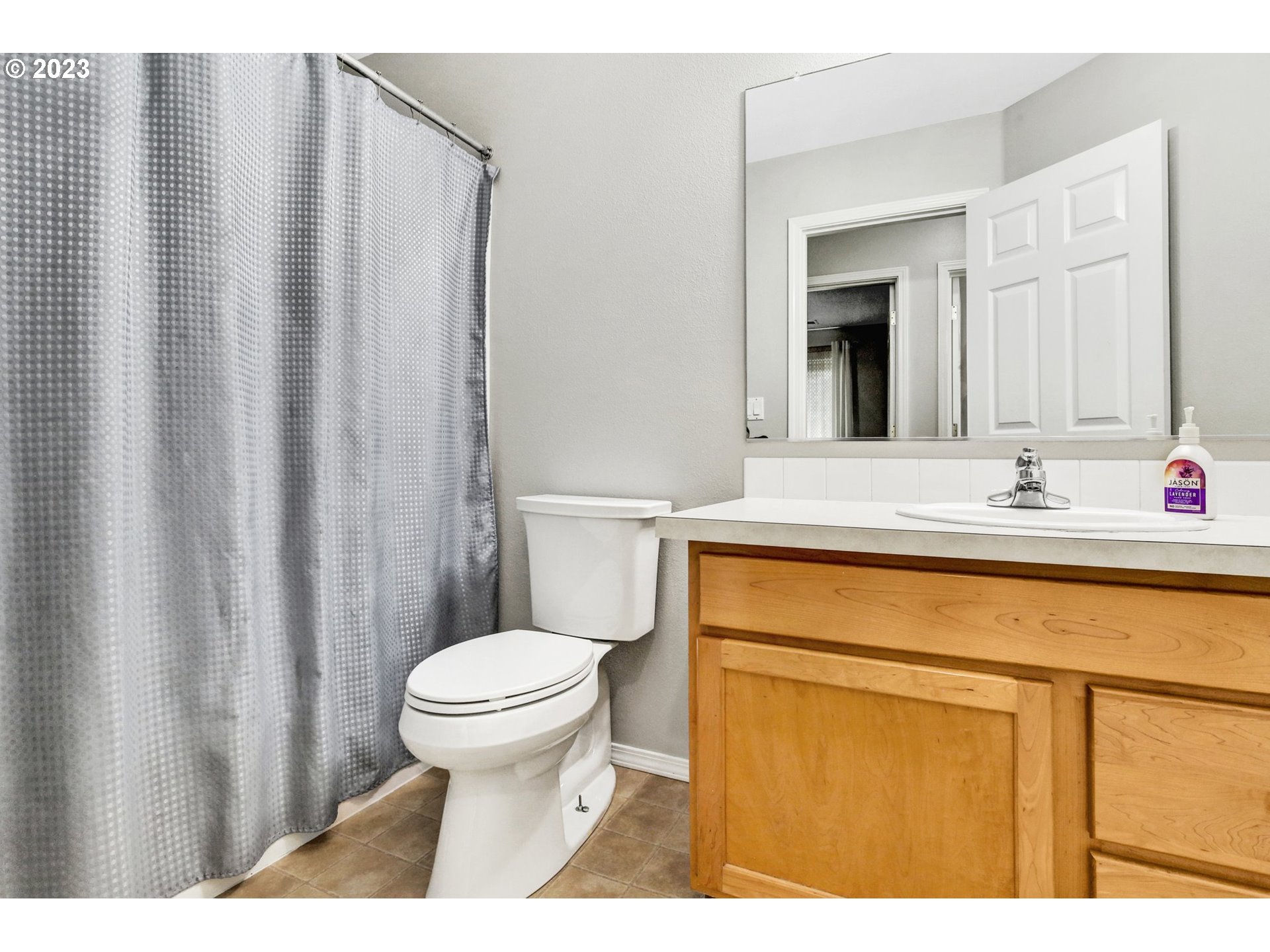 16128 Southeast Rural Court Portland, OR 97236 - Photo 32 of 37 a bathroom with a sink toilet and shower