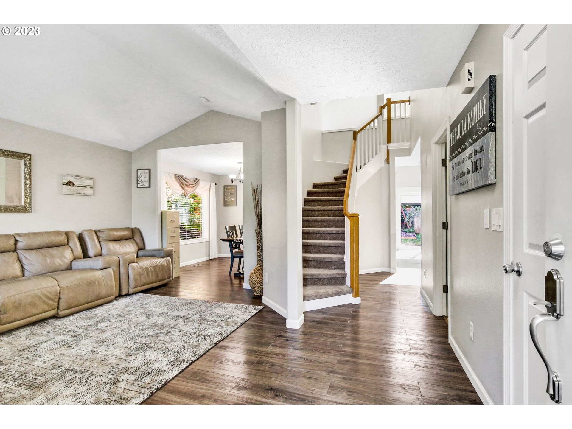 16128 Southeast Rural Court Portland, OR 97236 - Photo 5 of 37 a living room with furniture and wooden floor