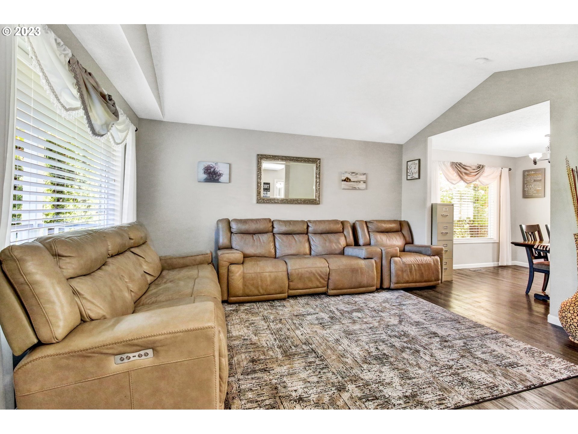 16128 Southeast Rural Court Portland, OR 97236 - Photo 6 of 37 a living room with furniture and a couch