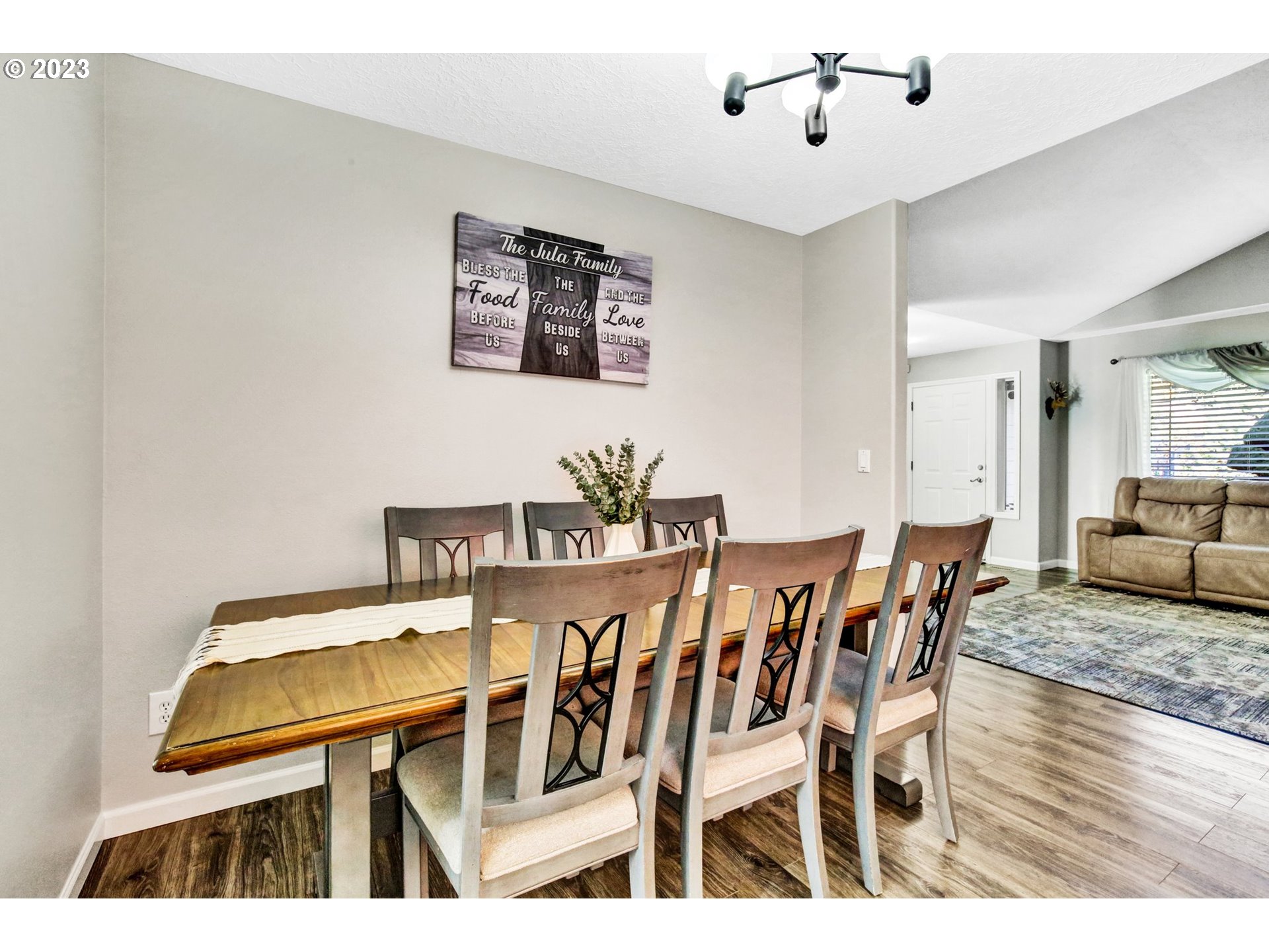 16128 Southeast Rural Court Portland, OR 97236 - Photo 9 of 37 a view of a dining room with furniture