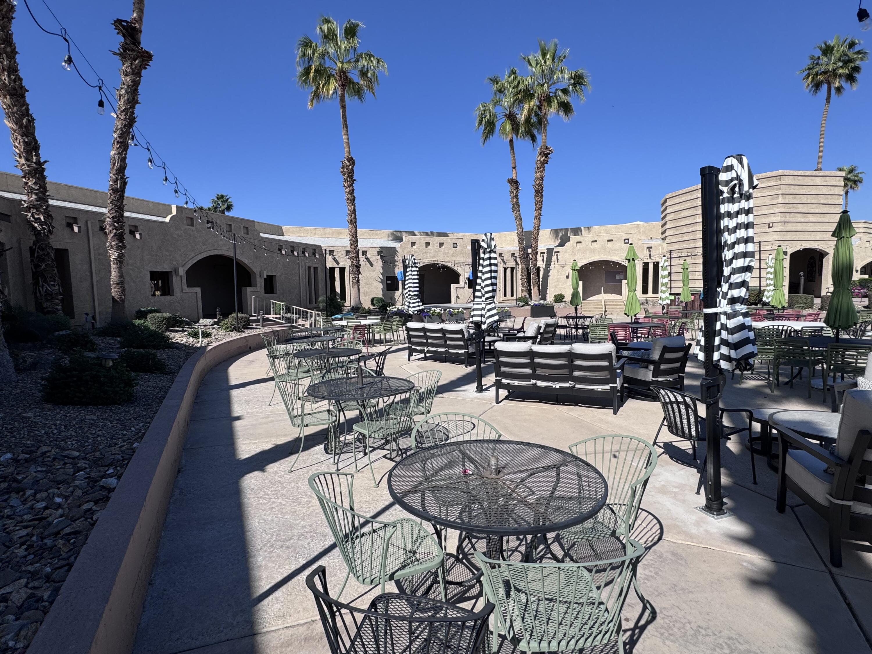 81620 Ave 49, Unit 160B Indio, CA 92201 - Photo 18 of 18 a view of a terrace with furniture