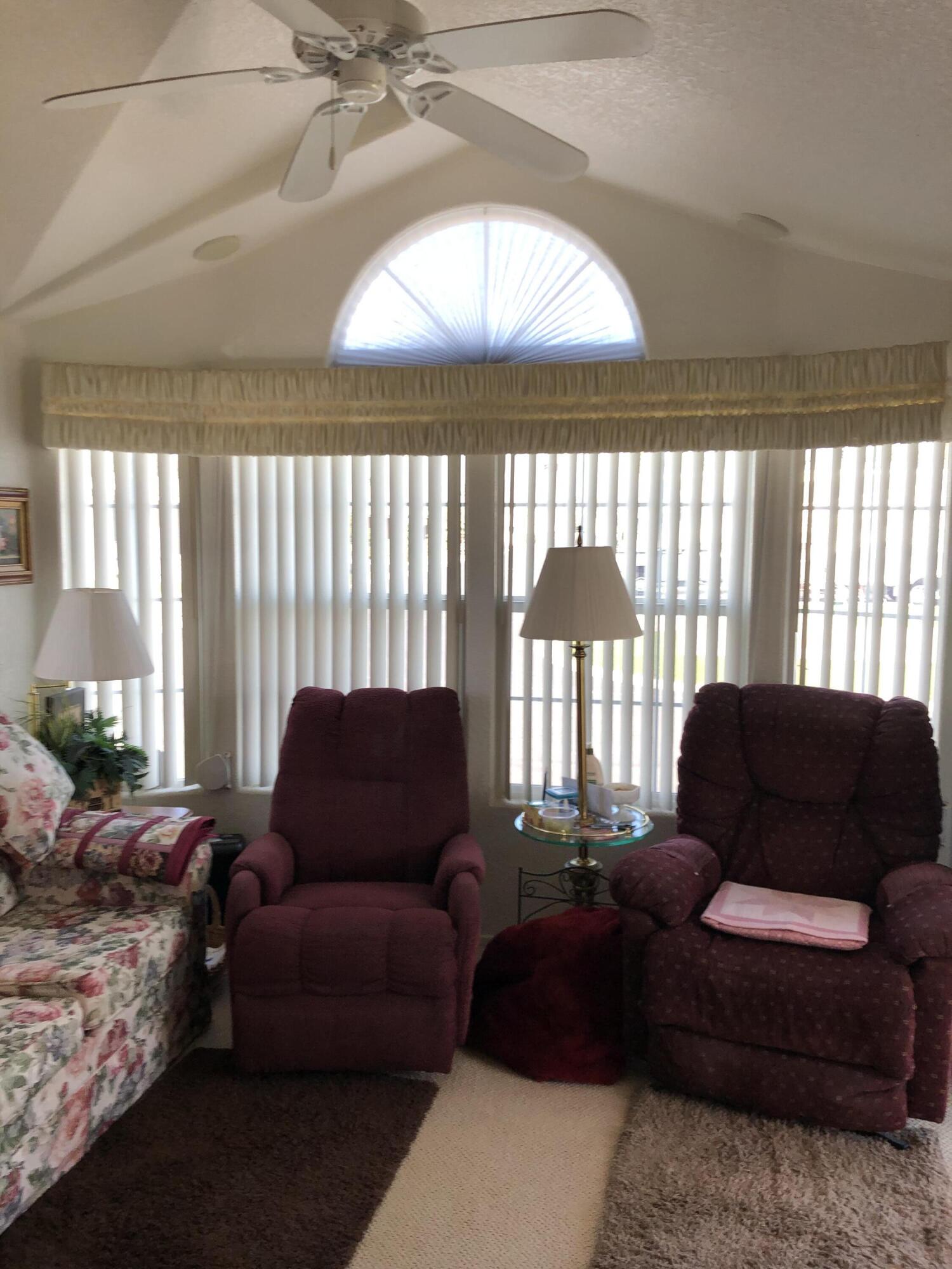 81620 Ave 49, Unit 160B Indio, CA 92201 - Photo 2 of 18 a living room with furniture and a large window