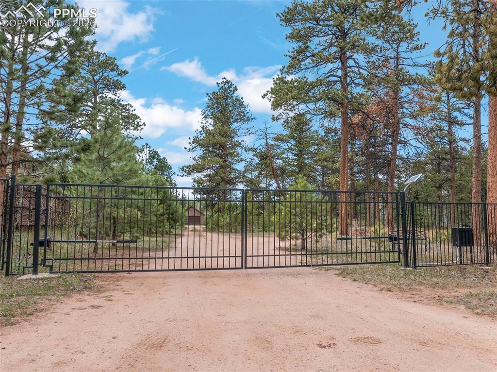 1100 Rampart Range Road Woodland Park, CO 80863 - Photo 48 of 50 Private gated entry