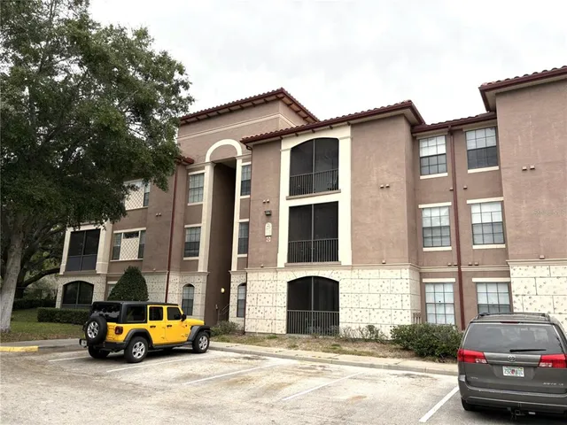 a car parked in front of a building