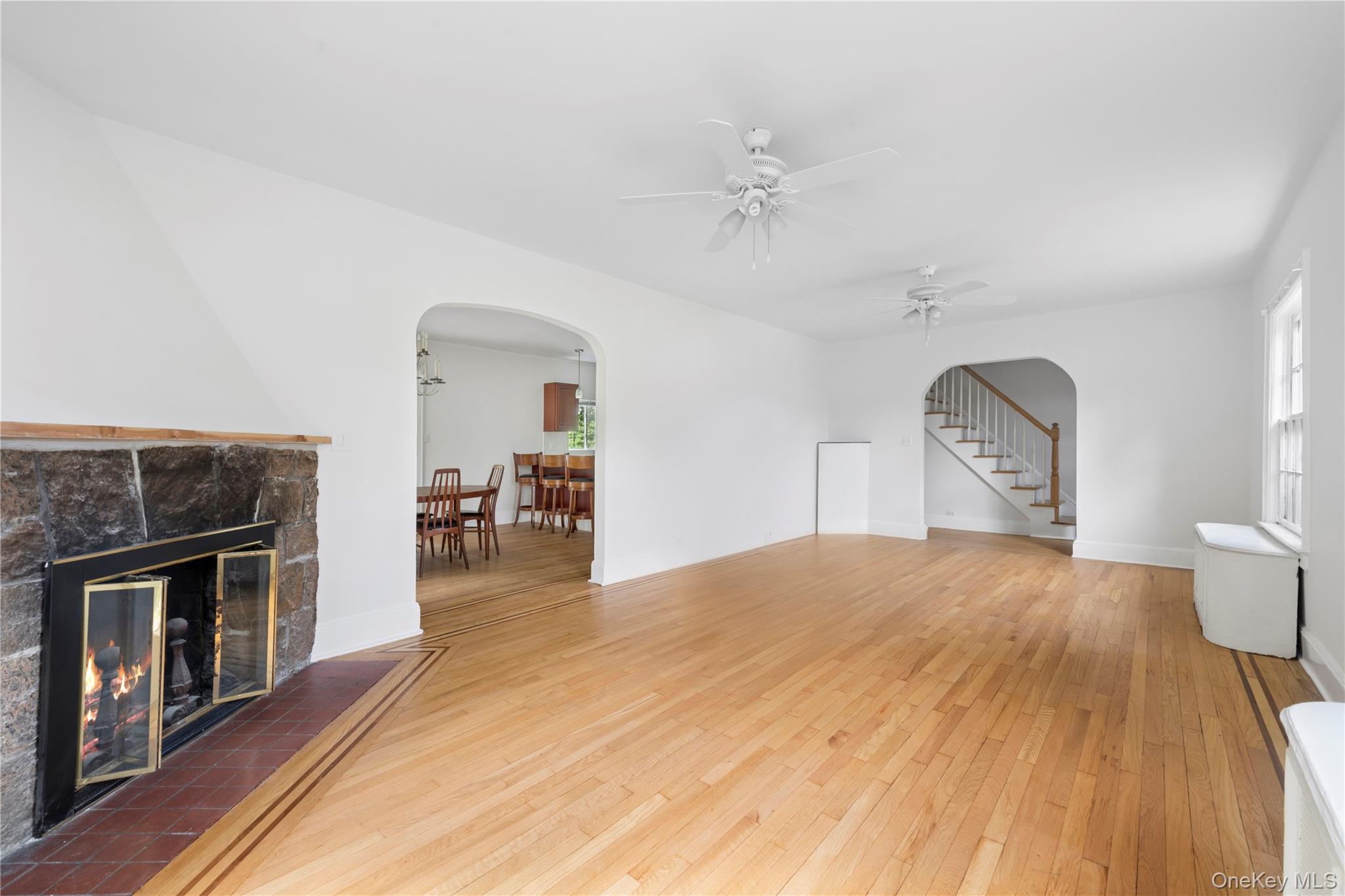 17 Old Orchard Road New Rochelle, NY 10804 - Photo 21 of 32 a bedroom with a bed and a fireplace