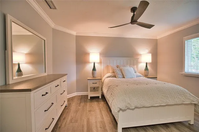 a bed room with a bed and a window