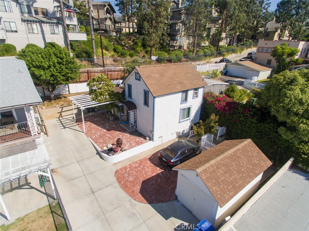 an aerial view of a house having patio