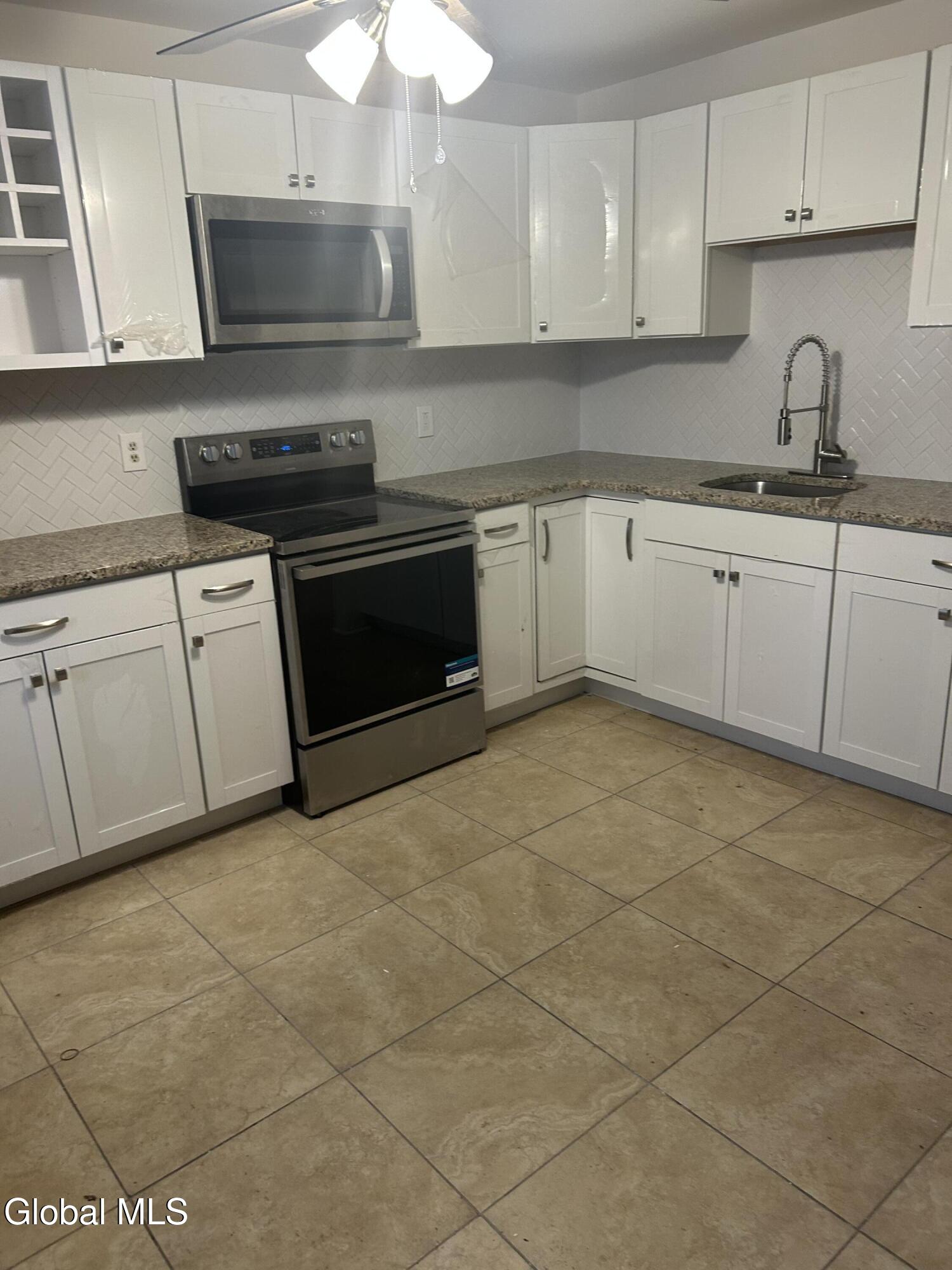 18 1/2 Voorhees Street, Unit 1 Amsterdam, NY 12010 - Photo 3 of 7 Voorhees k 2