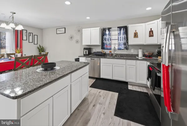 a kitchen with granite countertop lots of counter top space