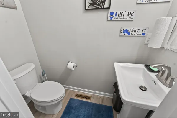 a bathroom with a sink and a toilet