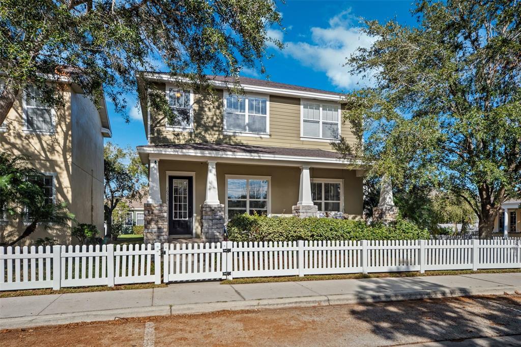 10515 Fenceline Road New Port Richey, FL 34655 - Photo 1 of 1 a front view of a house with a garden