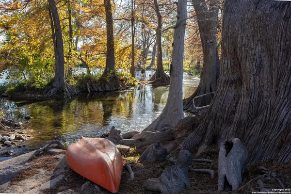 a view of a lake with sitting space