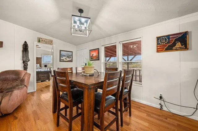 a view of a dining room with furniture