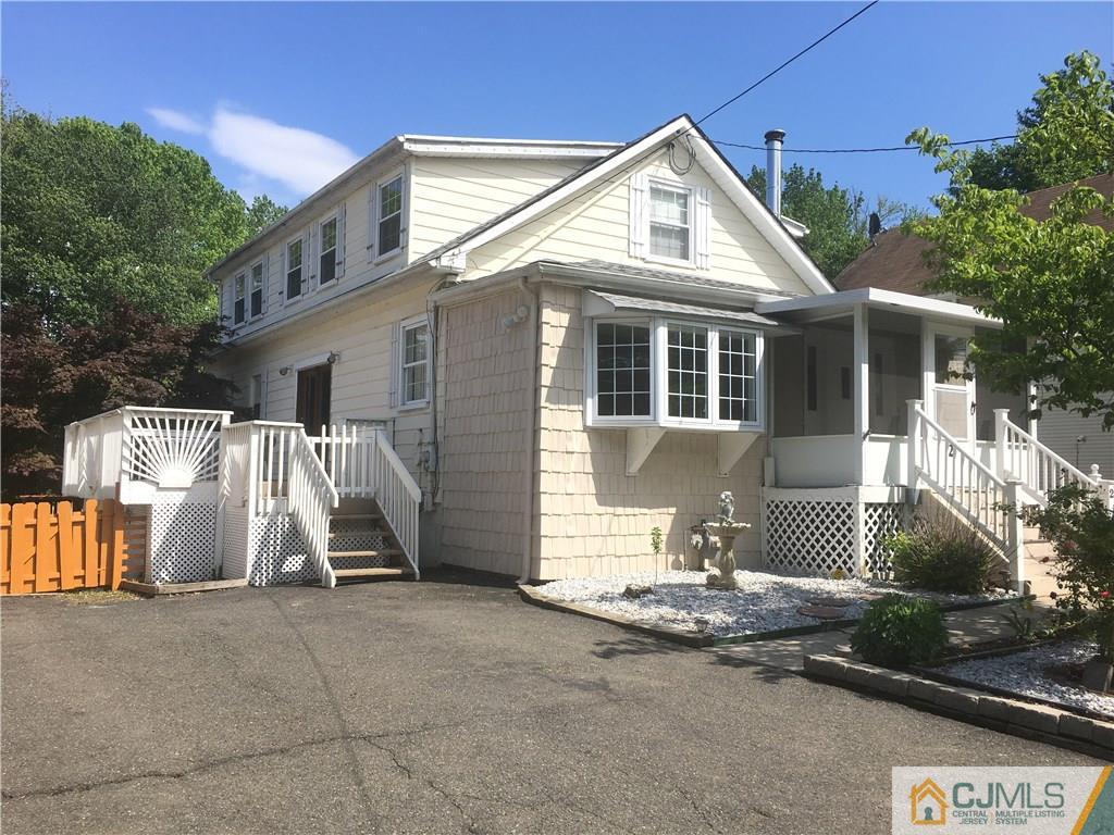 2 Matawan Road Old Bridge, NJ 08879 - Photo 2 of 15 a front view of a house with a yard