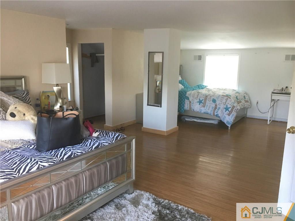 2 Matawan Road Old Bridge, NJ 08879 - Photo 6 of 15 a living room with furniture and a couch