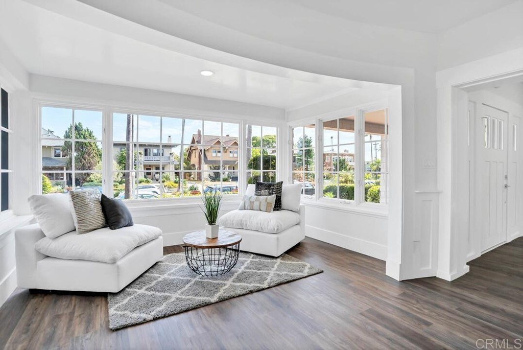 1864 Sunset Boulevard San Diego, CA 92103 - Photo 16 of 57 a living room with furniture and a large window