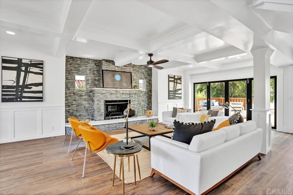 1864 Sunset Boulevard San Diego, CA 92103 - Photo 17 of 57 a living room with fireplace furniture and a wooden floor