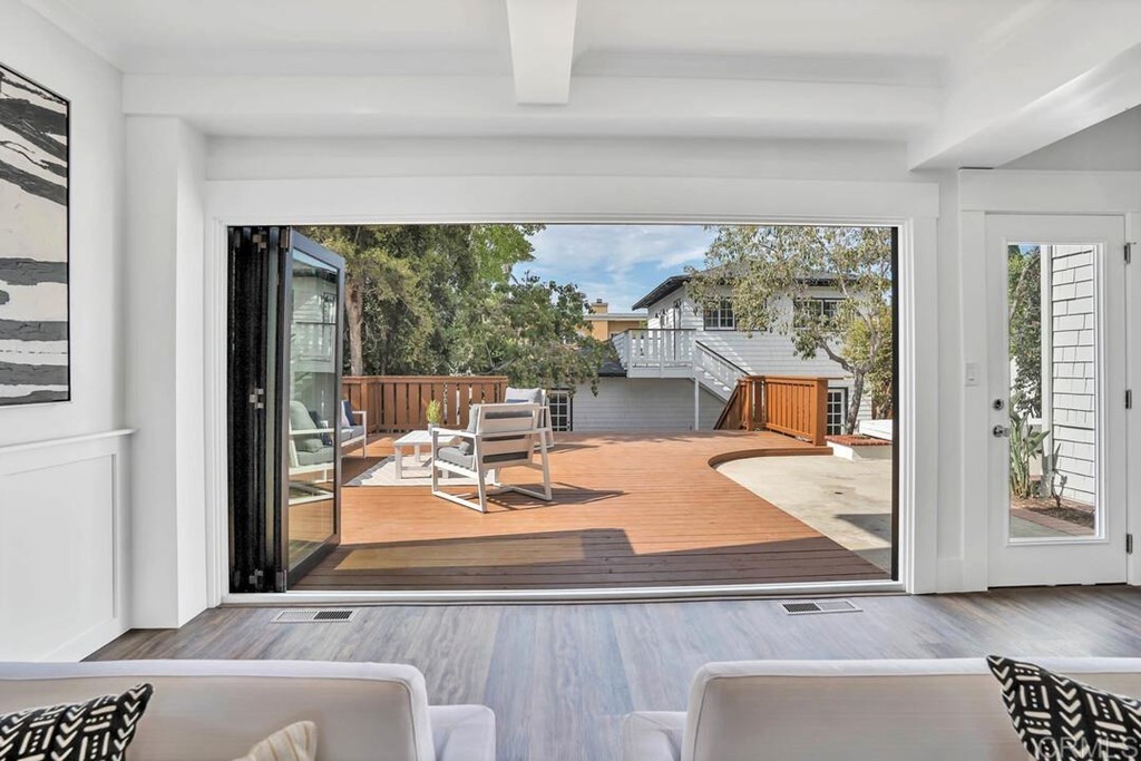 1864 Sunset Boulevard San Diego, CA 92103 - Photo 24 of 57 view of living room with furniture and floor to ceiling window