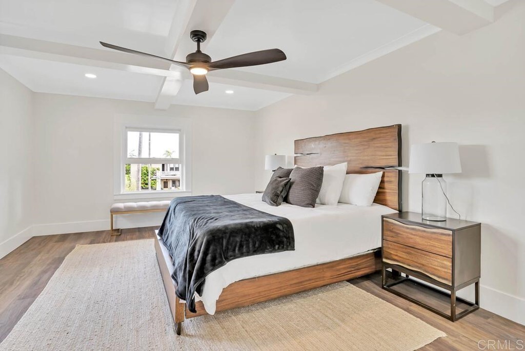 1864 Sunset Boulevard San Diego, CA 92103 - Photo 26 of 57 a bedroom with a bed and a window