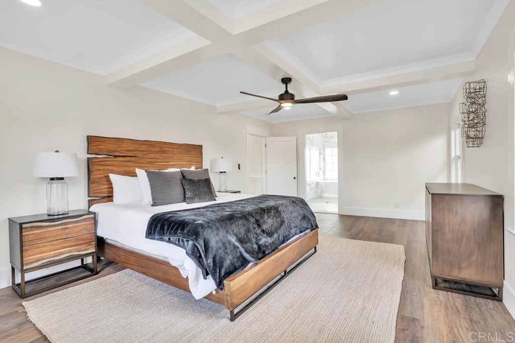 1864 Sunset Boulevard San Diego, CA 92103 - Photo 27 of 57 a bedroom with a bed and a walk in closet