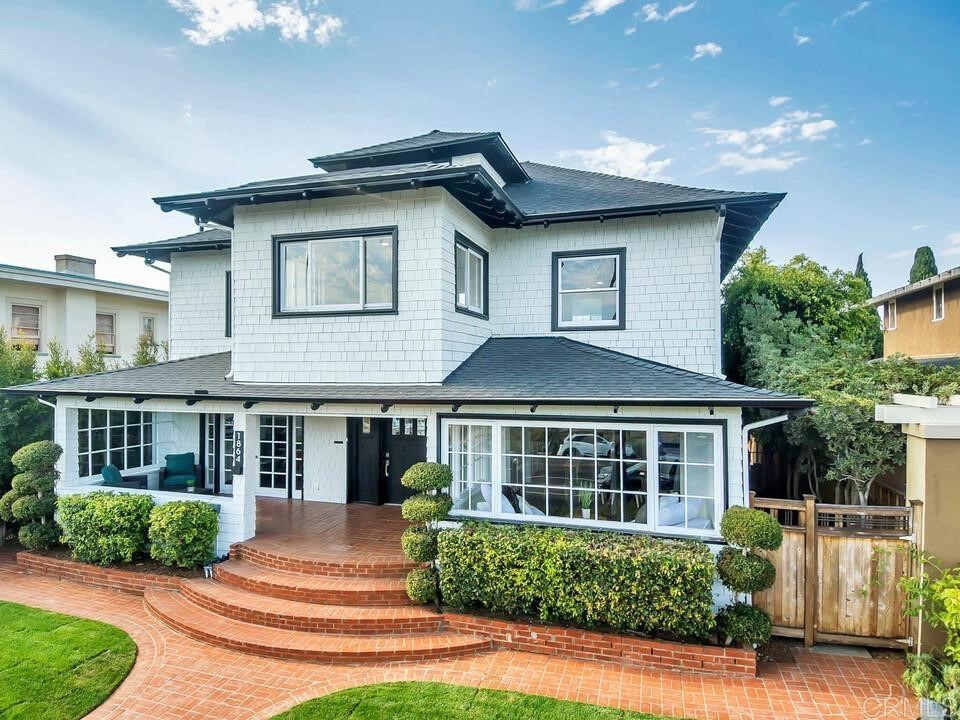 1864 Sunset Boulevard San Diego, CA 92103 - Photo 4 of 57 a front view of a house with a yard