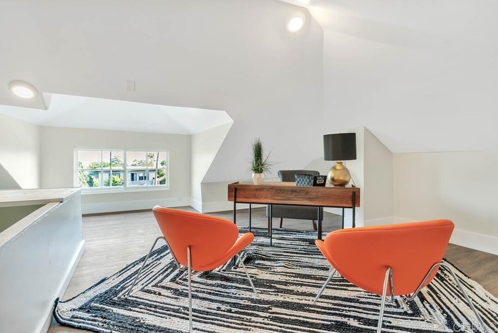 1864 Sunset Boulevard San Diego, CA 92103 - Photo 40 of 57 a living room with furniture a rug and a window