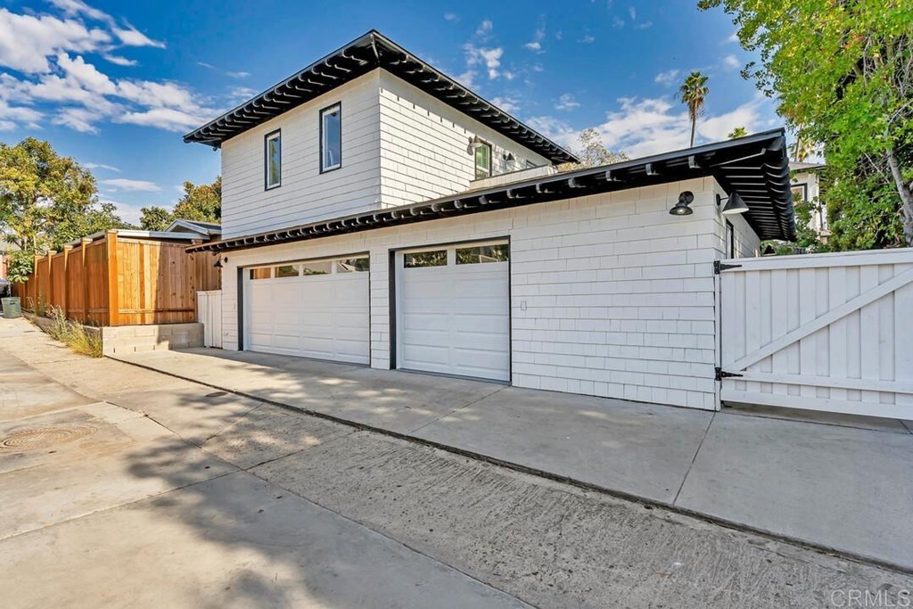 1864 Sunset Boulevard San Diego, CA 92103 - Photo 43 of 57 a front view of a house with a garage